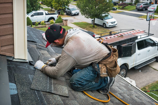 Professional Flat Roof Repair technician working in Brewster, WA